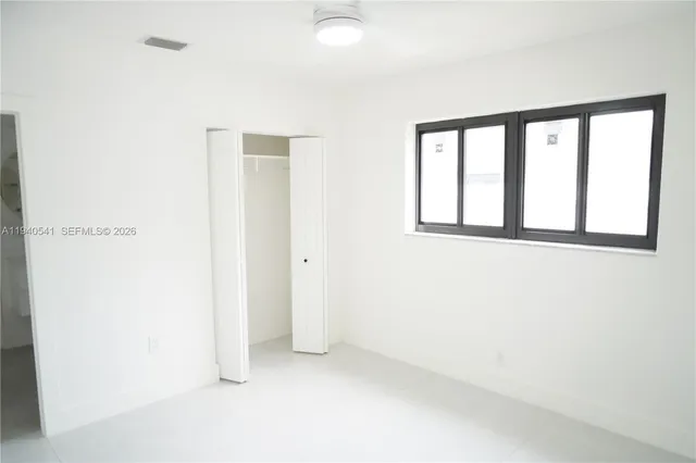 an empty room with a window