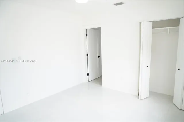 an empty room with a window