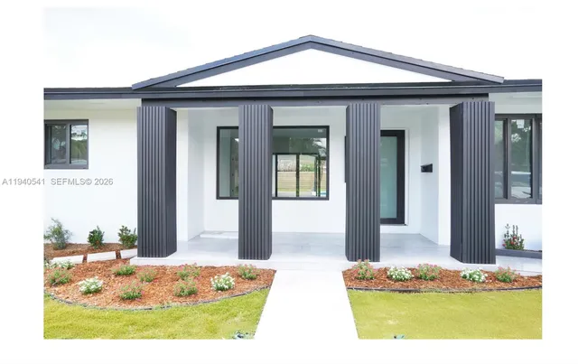 a front view of house with yard