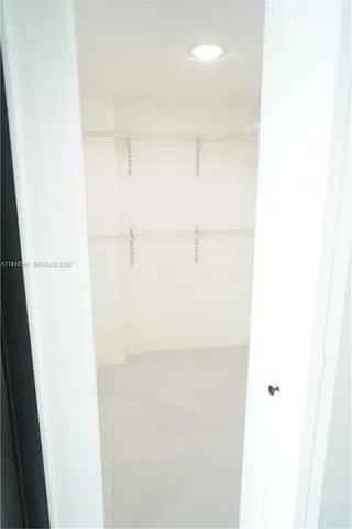 a view of swimming pool with outdoor seating