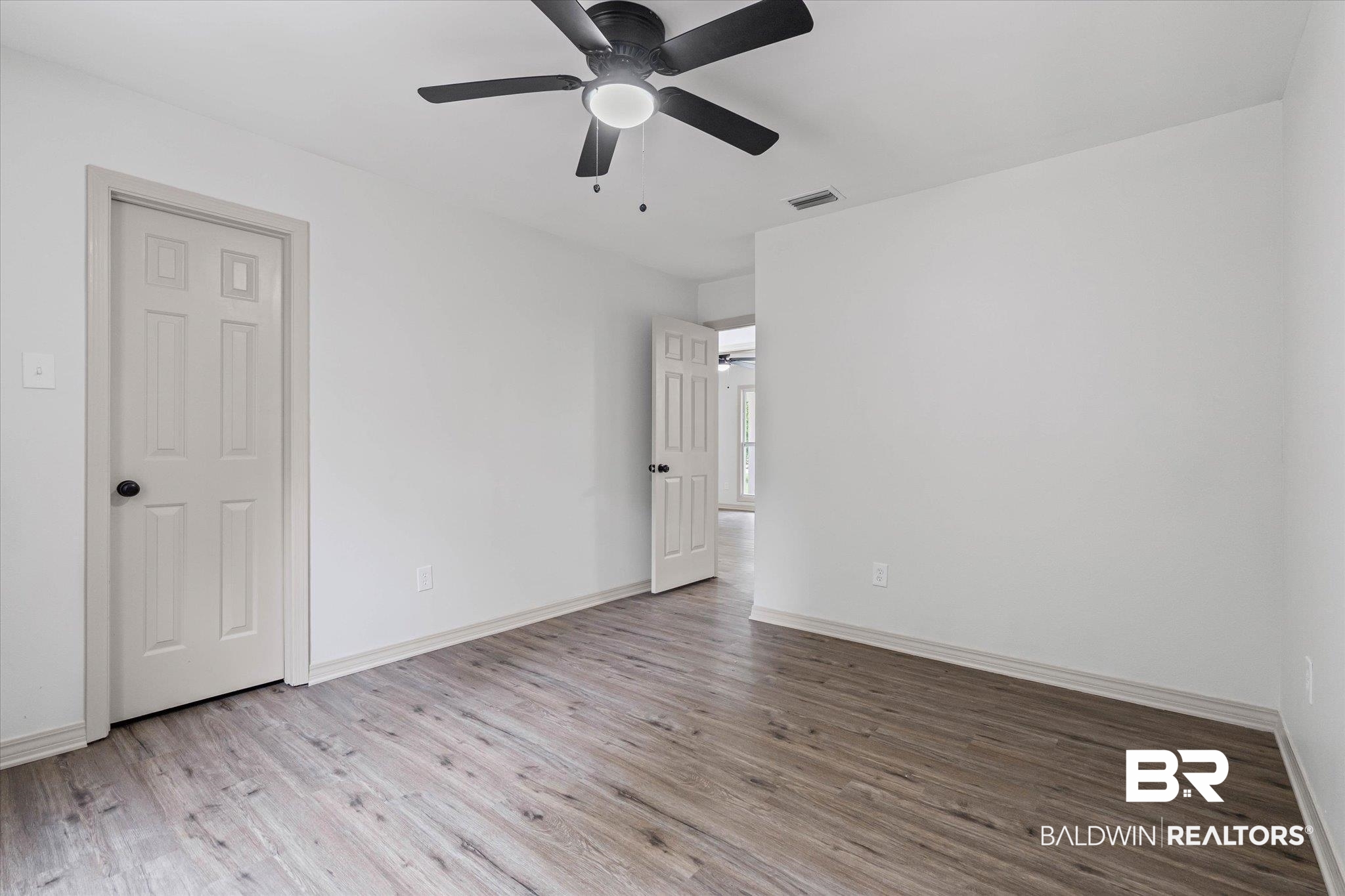 3655 Claridge Road South Mobile, AL 36608 - Photo 26 of 32 Unfurnished bedroom with light wood-style floors and ceiling fan