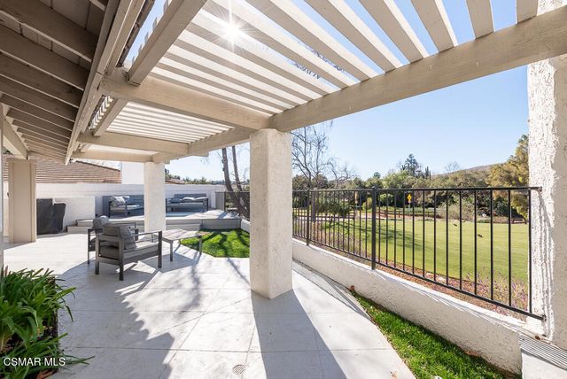 a view of a house with patio