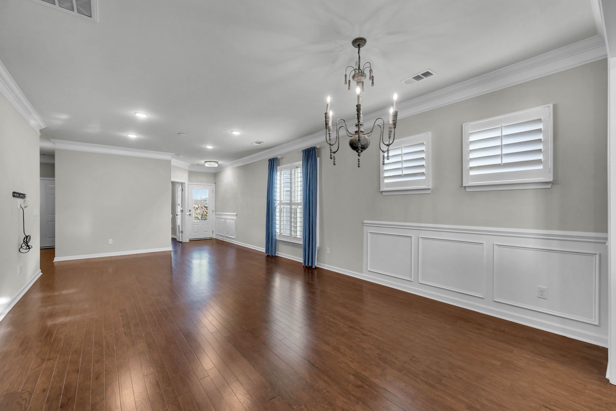 843 Clay Place Spring Hill, TN 37174 - Photo 11 of 56 a view of an empty room with wooden floor and a window