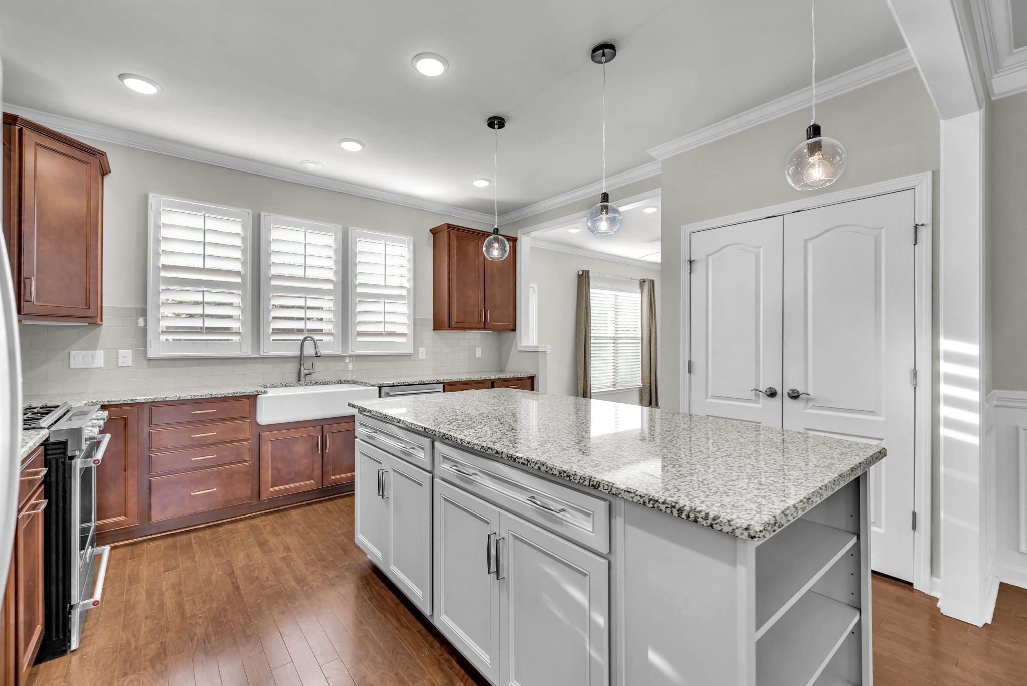 843 Clay Place Spring Hill, TN 37174 - Photo 16 of 56 a kitchen with stainless steel appliances granite countertop stove top oven and cabinets