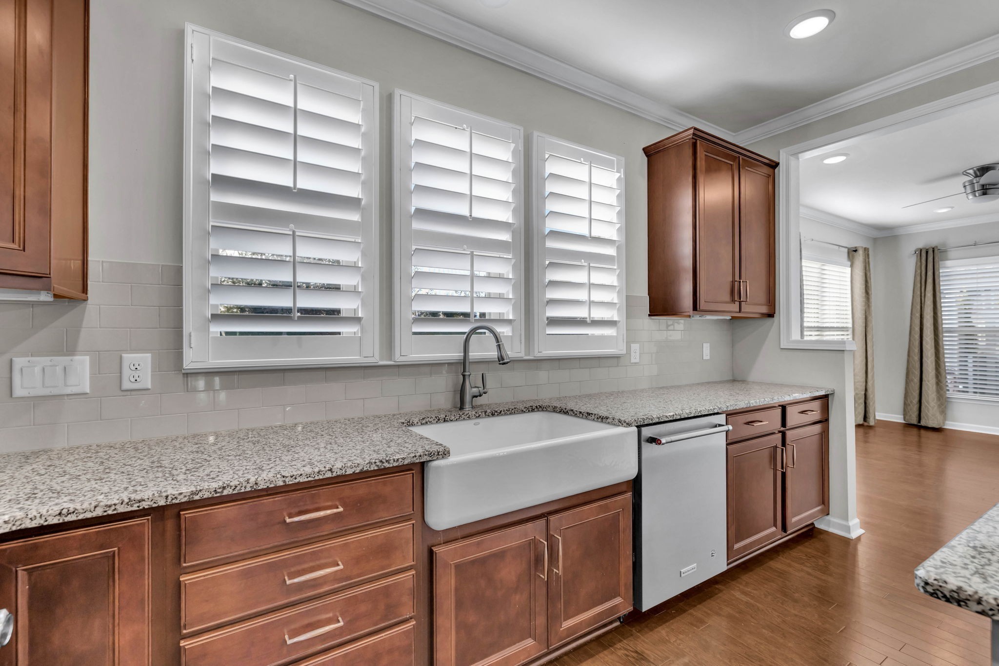 843 Clay Place Spring Hill, TN 37174 - Photo 17 of 56 a kitchen with stainless steel appliances granite countertop cabinets sink and window