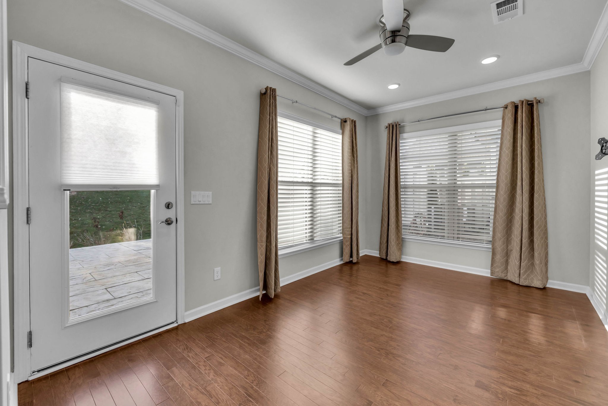 843 Clay Place Spring Hill, TN 37174 - Photo 21 of 56 a view of an empty room with wooden floor and a window