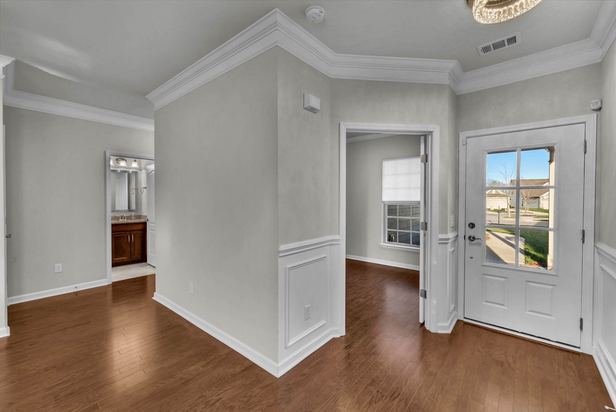843 Clay Place Spring Hill, TN 37174 - Photo 23 of 56 an empty room with wooden floor and windows