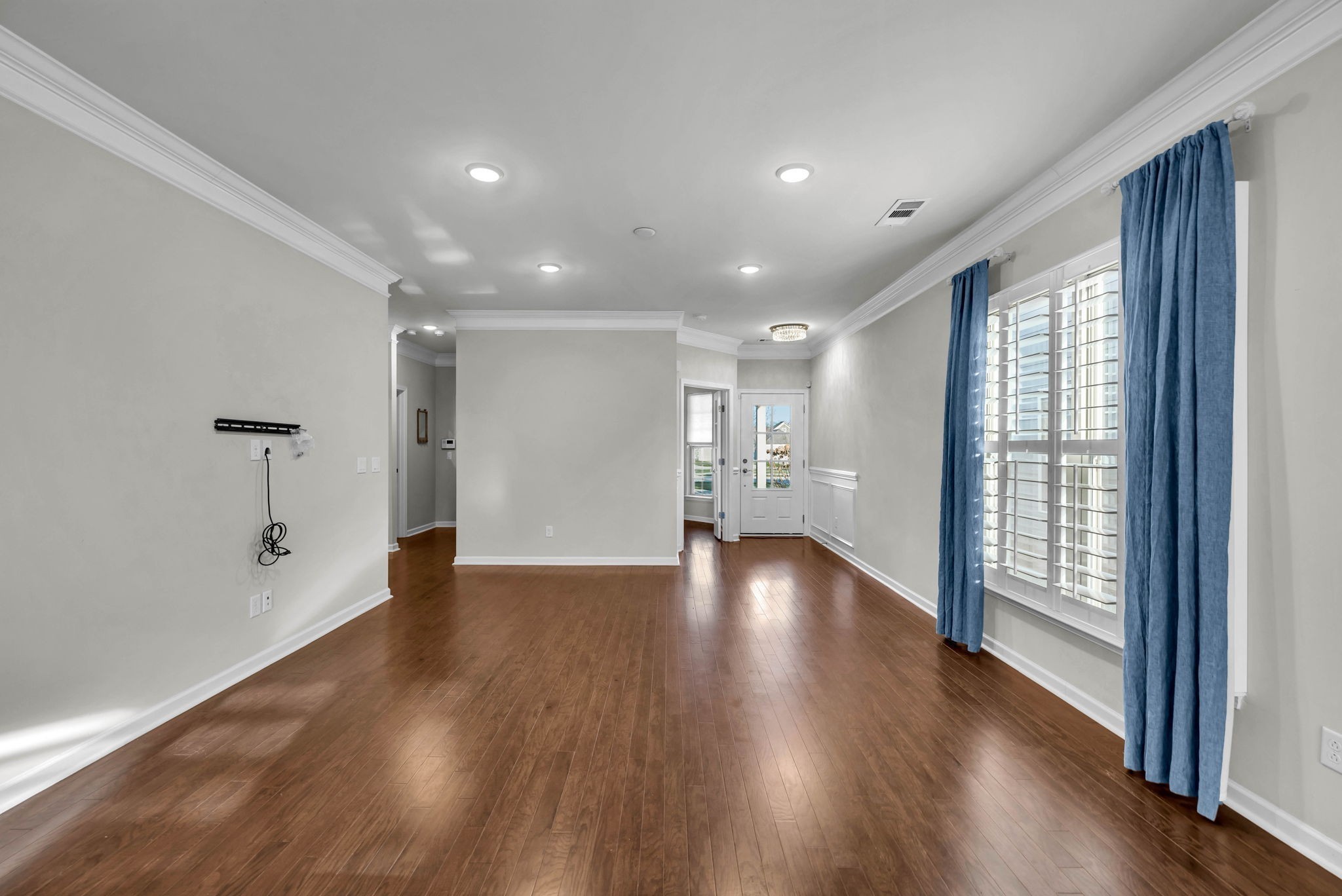 843 Clay Place Spring Hill, TN 37174 - Photo 25 of 56 a view of an empty room with wooden floor and a window