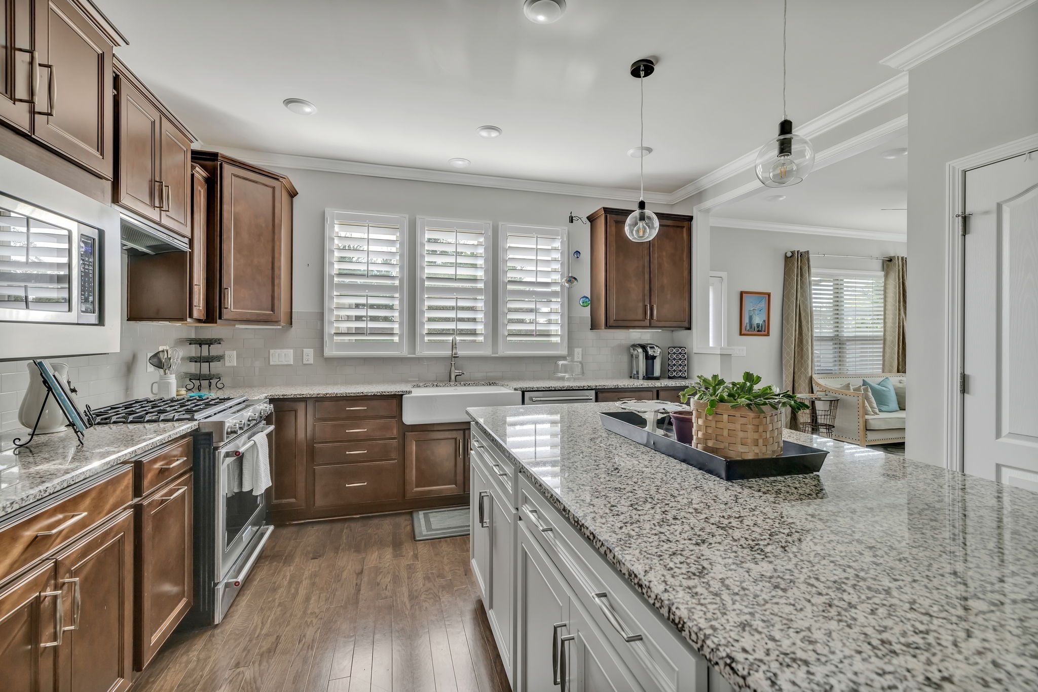 843 Clay Place Spring Hill, TN 37174 - Photo 26 of 56 a kitchen with a stove top oven sink and cabinets