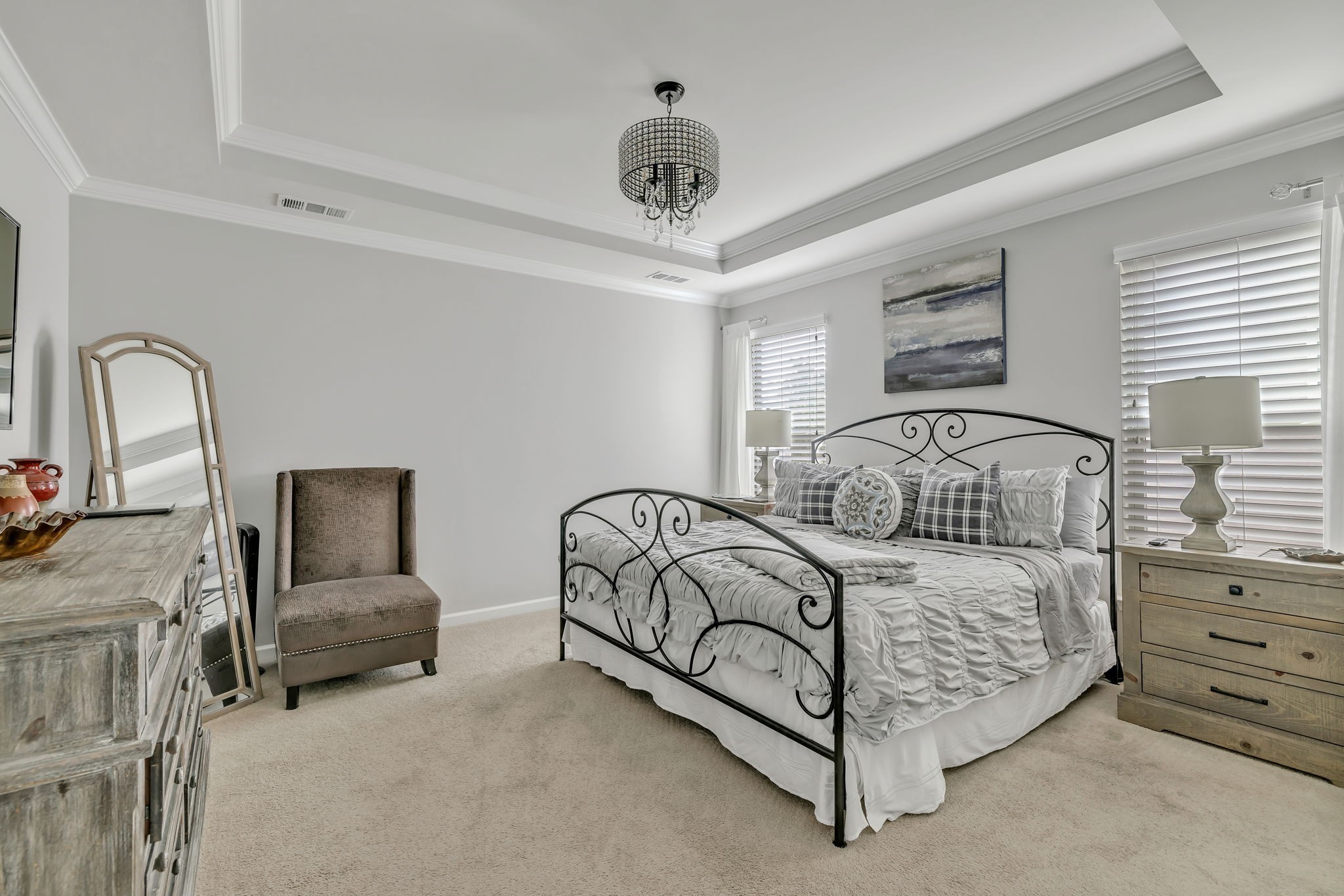 843 Clay Place Spring Hill, TN 37174 - Photo 29 of 56 a bedroom with a bed a couch and dresser