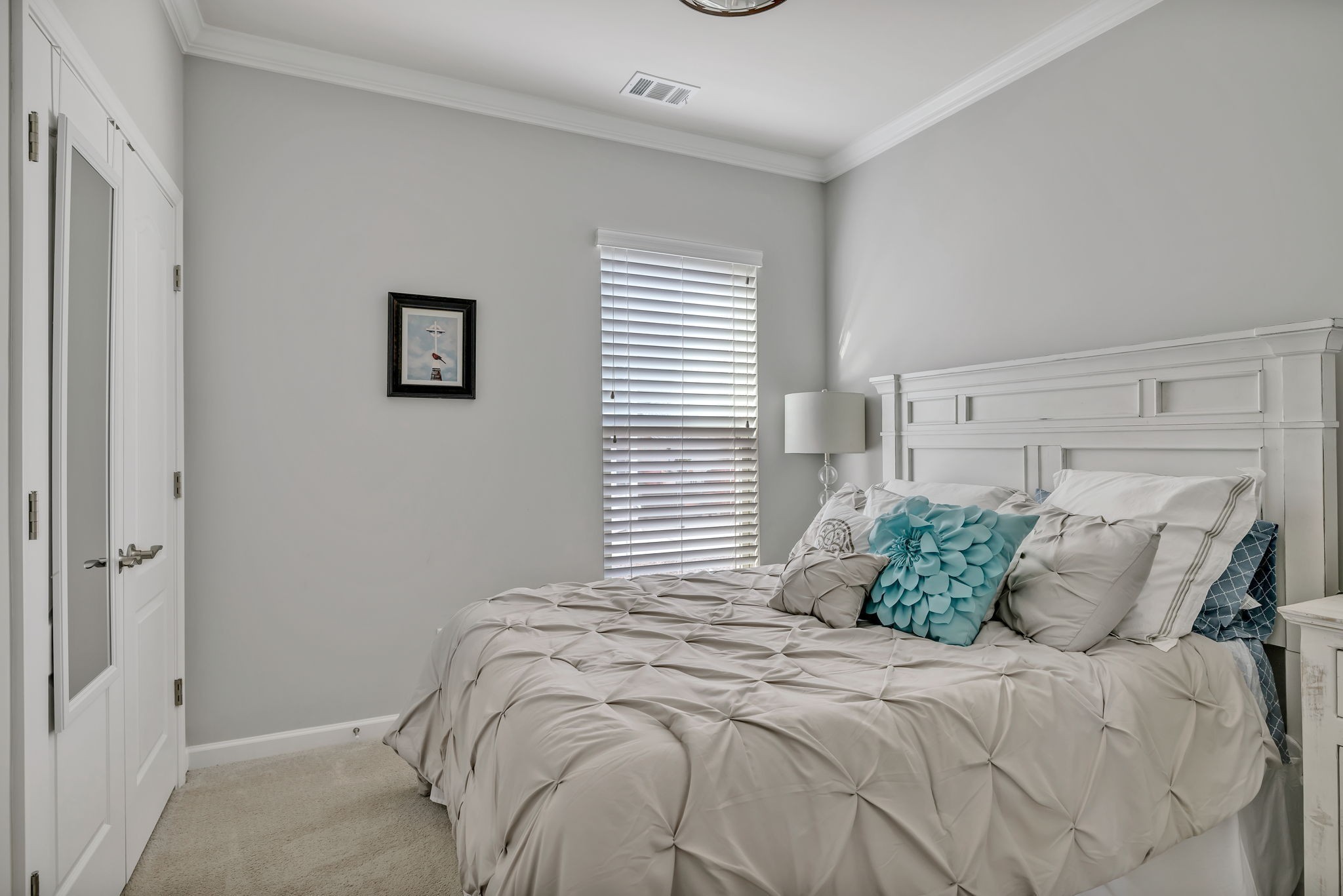 843 Clay Place Spring Hill, TN 37174 - Photo 31 of 56 a bedroom with a bed and a painting on the wall
