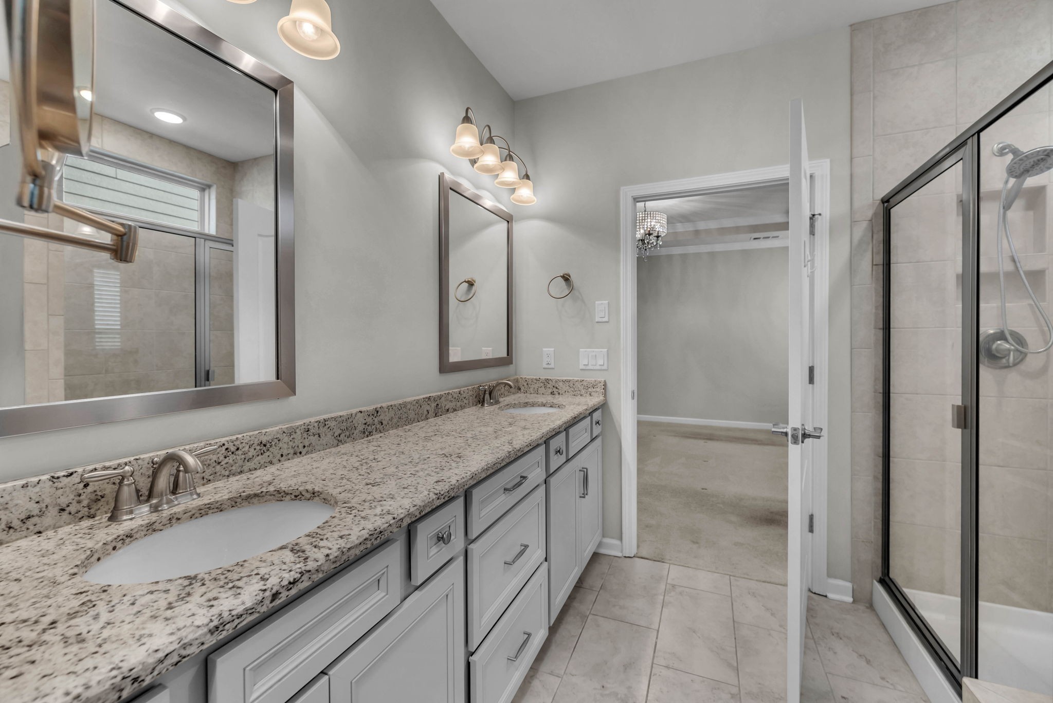 843 Clay Place Spring Hill, TN 37174 - Photo 32 of 56 a bathroom with a granite countertop sink and a mirror