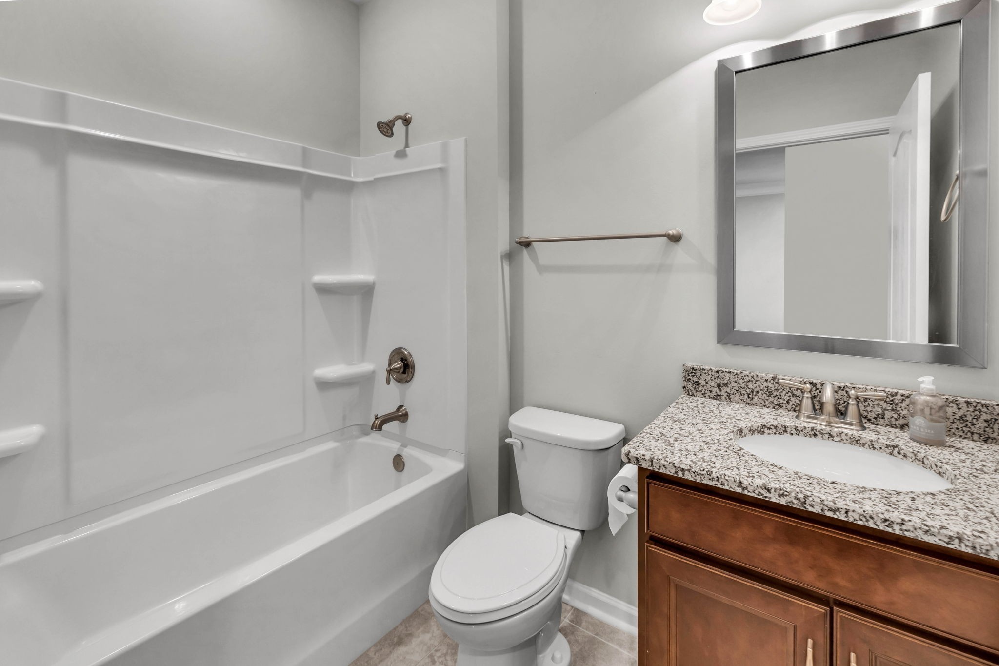 843 Clay Place Spring Hill, TN 37174 - Photo 36 of 56 a bathroom with a granite countertop sink toilet and shower