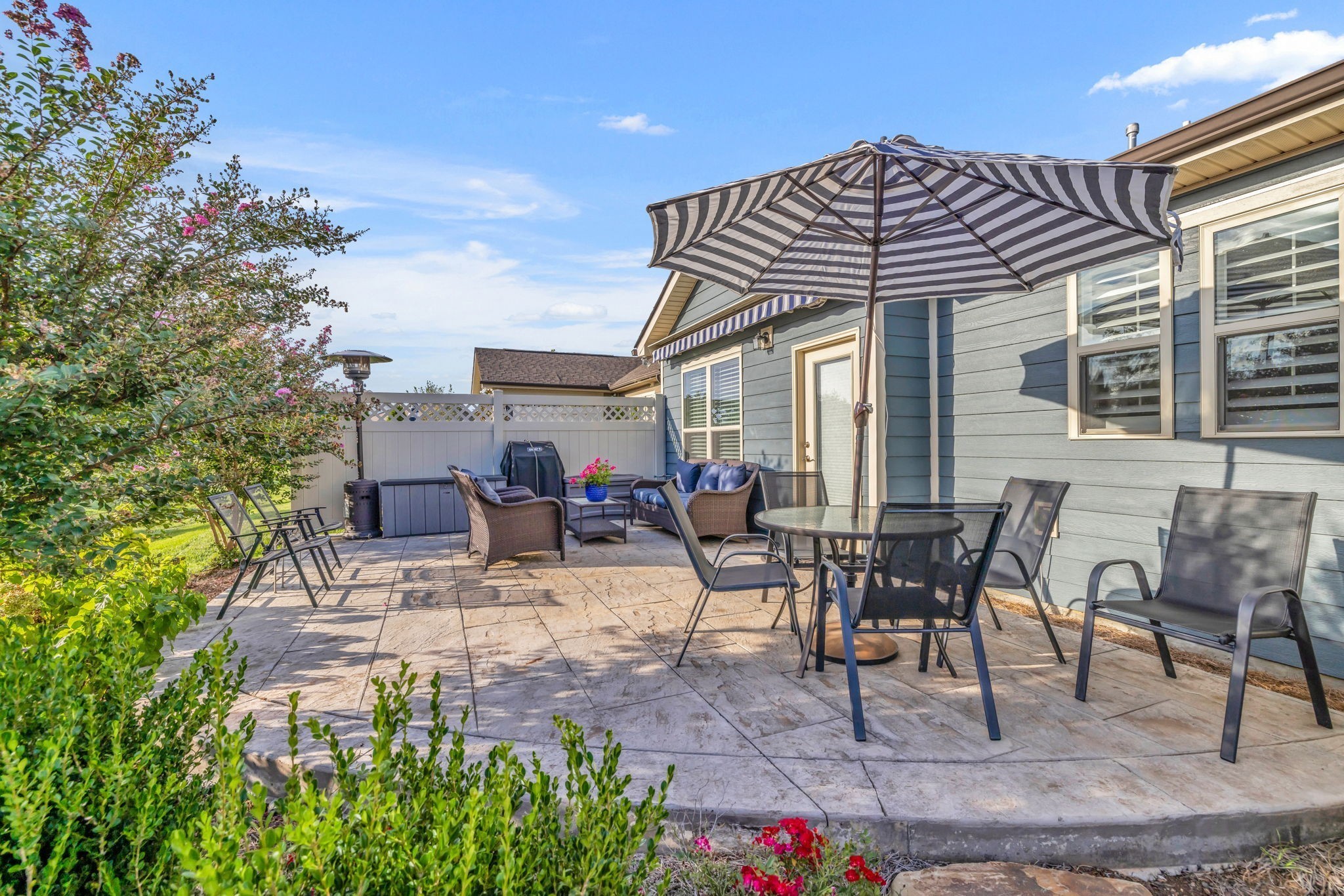 843 Clay Place Spring Hill, TN 37174 - Photo 39 of 56 a view of a patio with table and chairs and potted plants
