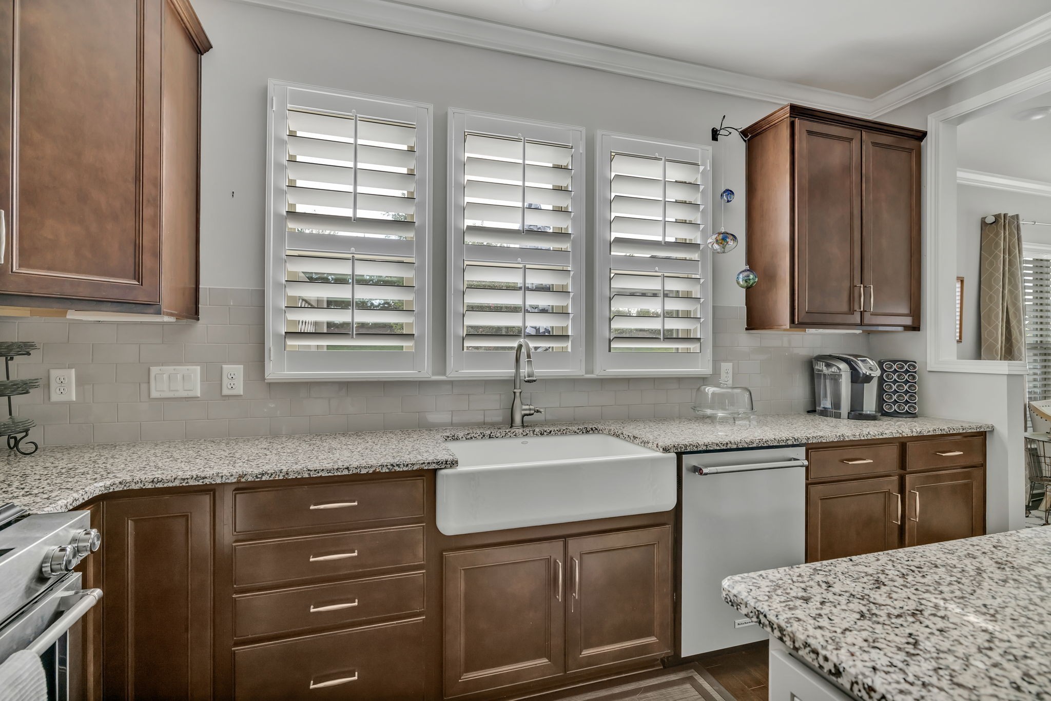 843 Clay Place Spring Hill, TN 37174 - Photo 49 of 56 a kitchen with a sink stove and cabinets