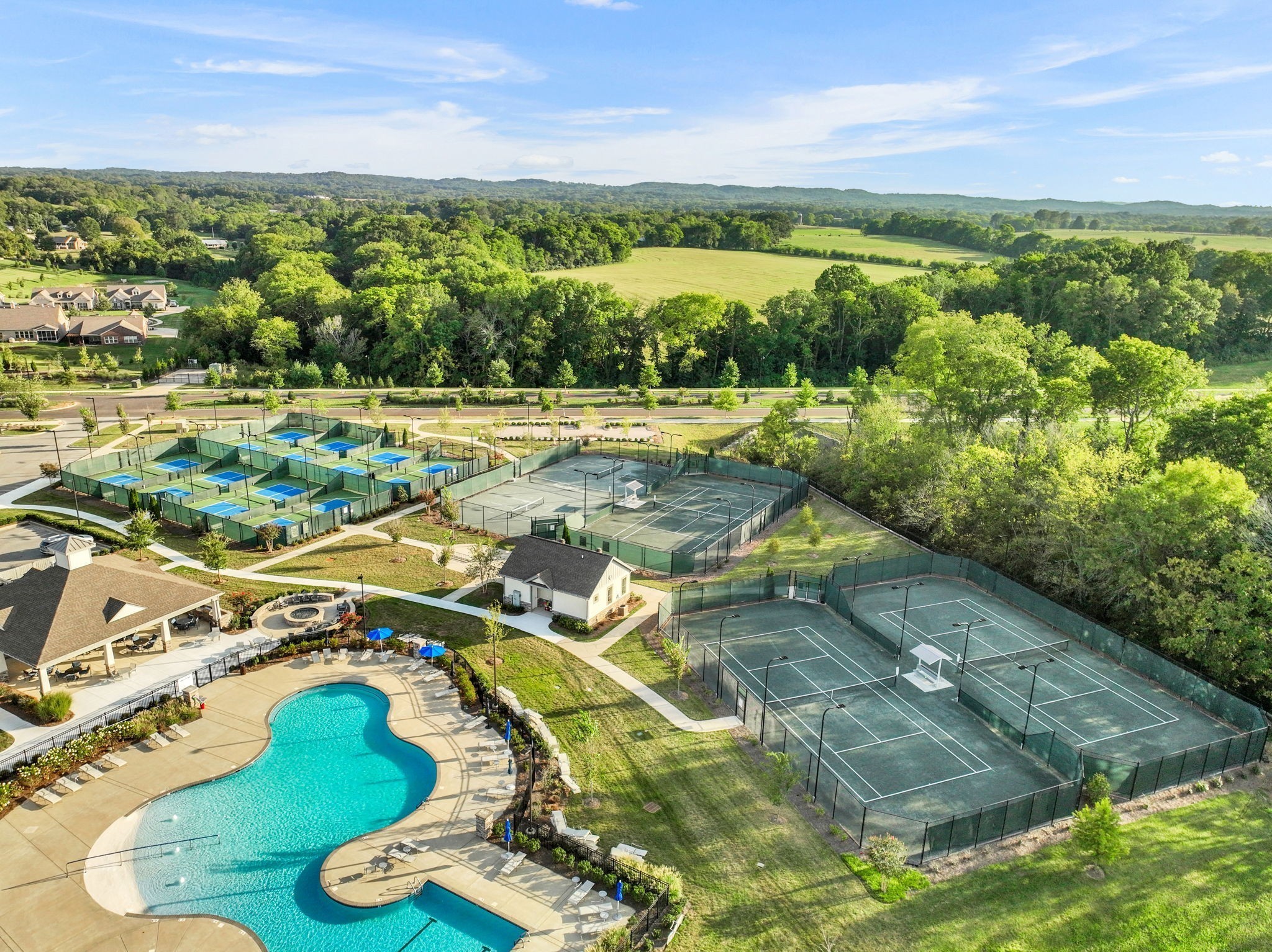 843 Clay Place Spring Hill, TN 37174 - Photo 53 of 56 a view of a swimming pool with a yard