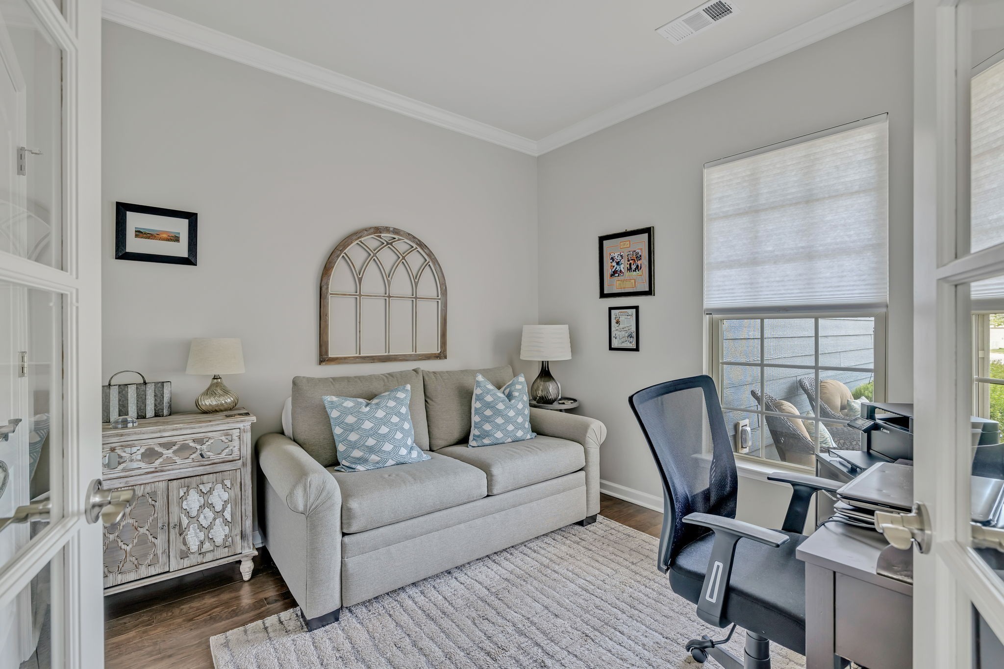 843 Clay Place Spring Hill, TN 37174 - Photo 10 of 56 a living room with furniture and a painting on the wall