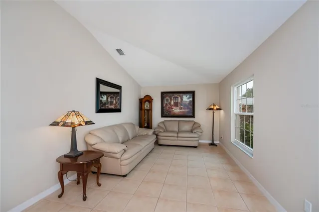 a kitchen with granite countertop a cabinets and steel stainless steel appliances