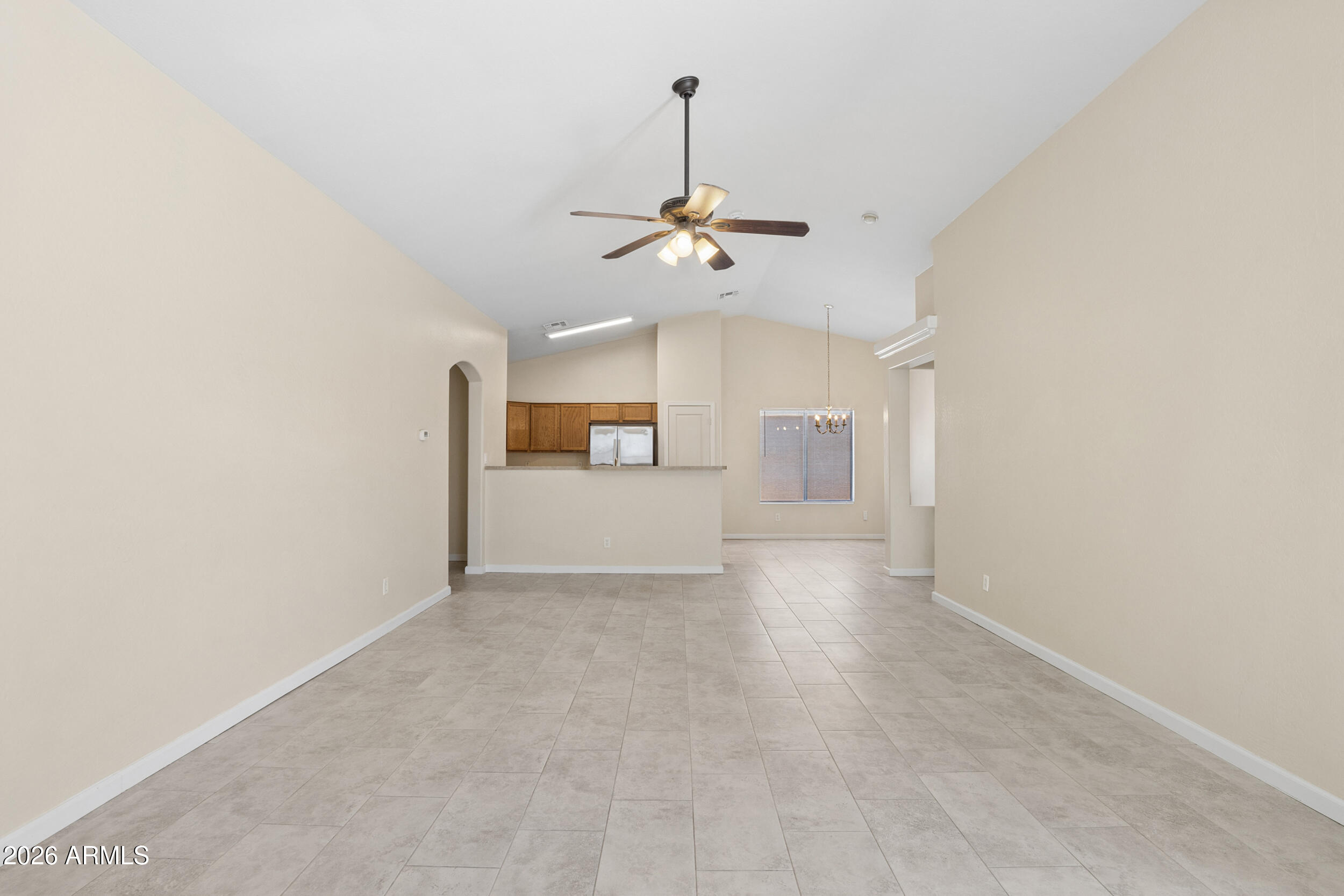 24025 West Pecan Road Buckeye, AZ 85326 - Photo 6 of 42 Living area looking towards Kitchen