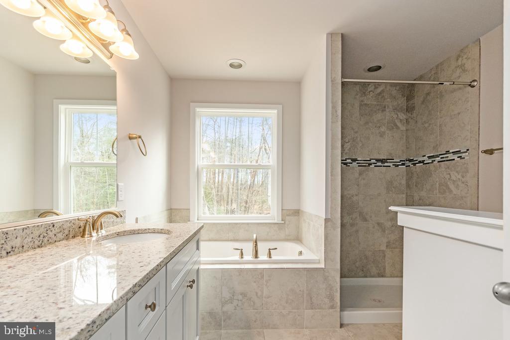 359 Ferry Road Fredericksburg, VA 22405 - Photo 5 of 30 Luxury awaits in this std. Owner's Suite Pkg