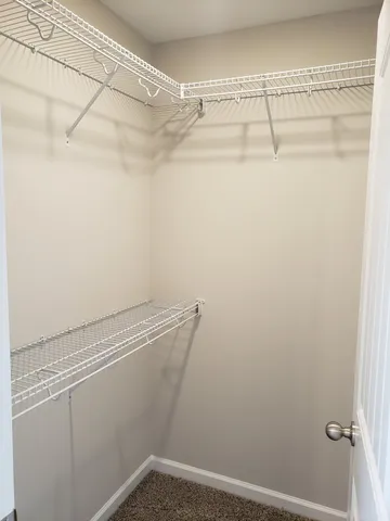 a view of a room with racks on the wall