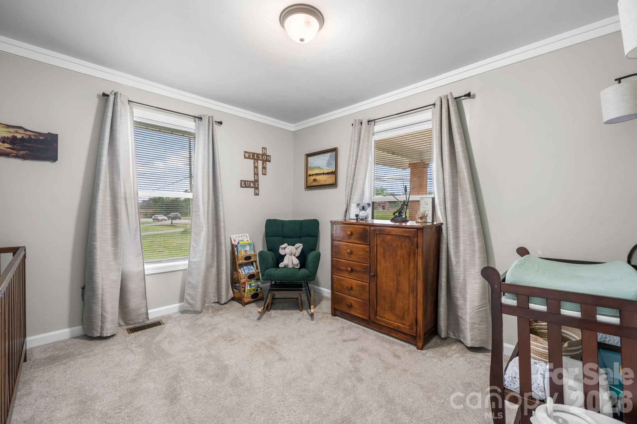 3941 Springs Road Northeast Conover, NC 28613 - Photo 17 of 21 a view of a workspace with furniture and a window