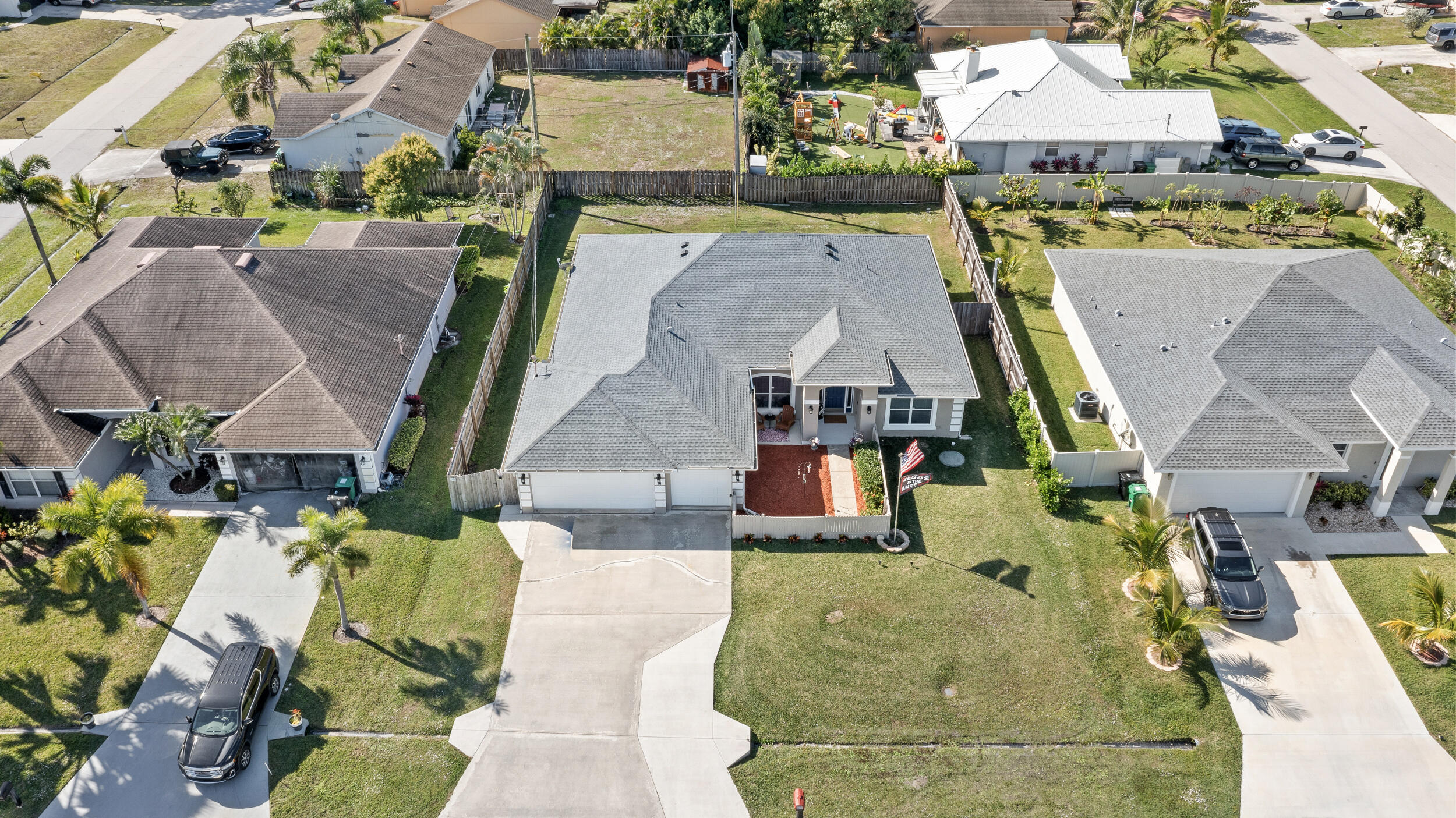 4164 Southwest Spickler Street Port St. Lucie, FL 34953 - Photo 4 of 35 an aerial view of houses with outdoor space