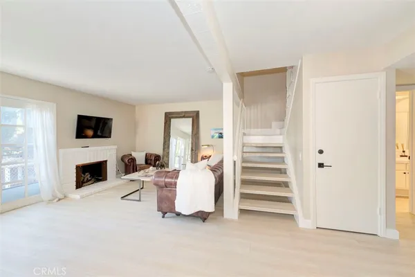 a view of a livingroom with a fireplace