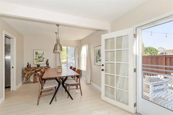 a view of a livingroom with furniture and window