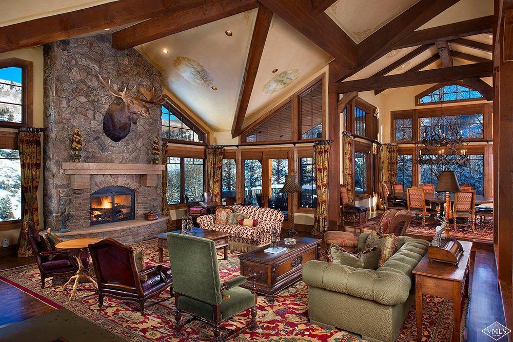 59 Borders Road Beaver Creek, CO 81620 - Photo 1 of 25 a living room with lots of furniture and a fireplace