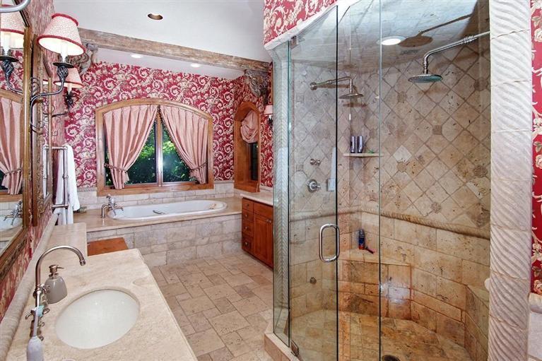 59 Borders Road Beaver Creek, CO 81620 - Photo 12 of 25 a bathroom with a granite countertop sink and a mirror