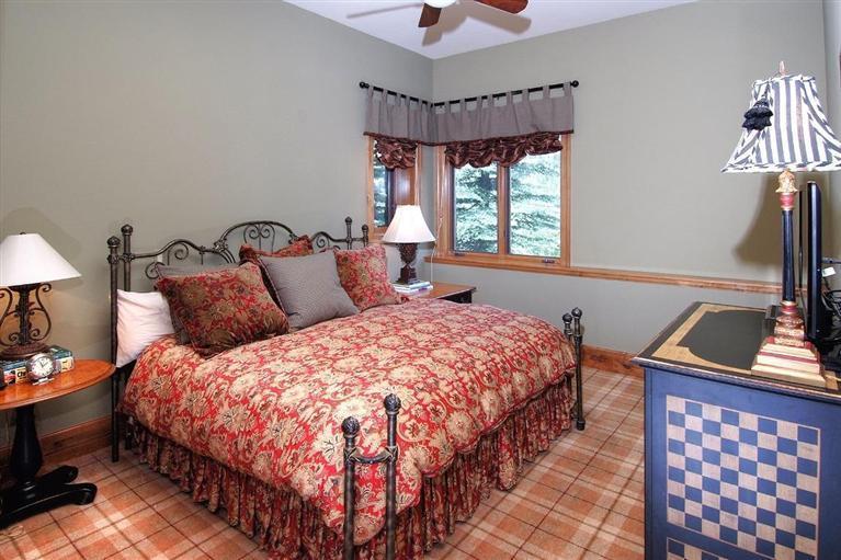 59 Borders Road Beaver Creek, CO 81620 - Photo 14 of 25 a bedroom with bed and a window