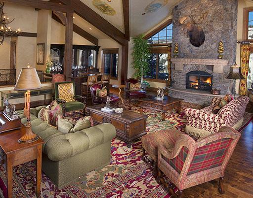 59 Borders Road Beaver Creek, CO 81620 - Photo 2 of 25 a living room with furniture a fireplace and a chandelier