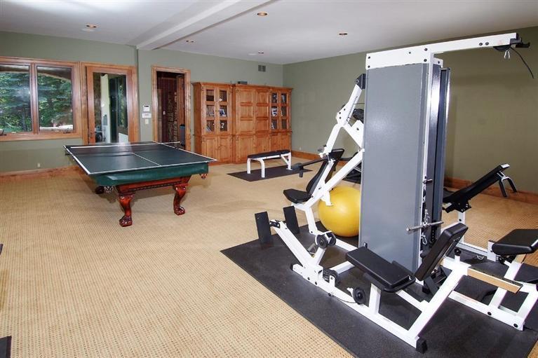 59 Borders Road Beaver Creek, CO 81620 - Photo 22 of 25 a living room with furniture pool table and windows