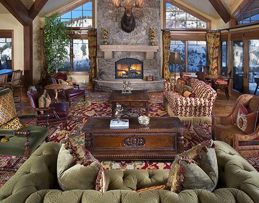 59 Borders Road Beaver Creek, CO 81620 - Photo 3 of 25 a living room with furniture a fireplace and floor to ceiling windows