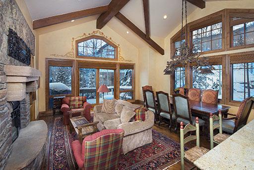 59 Borders Road Beaver Creek, CO 81620 - Photo 6 of 25 a living room with furniture a fireplace and a chandelier