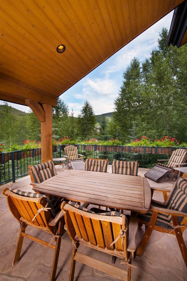59 Borders Road Beaver Creek, CO 81620 - Photo 10 of 25 a view of a chairs and table in the patio
