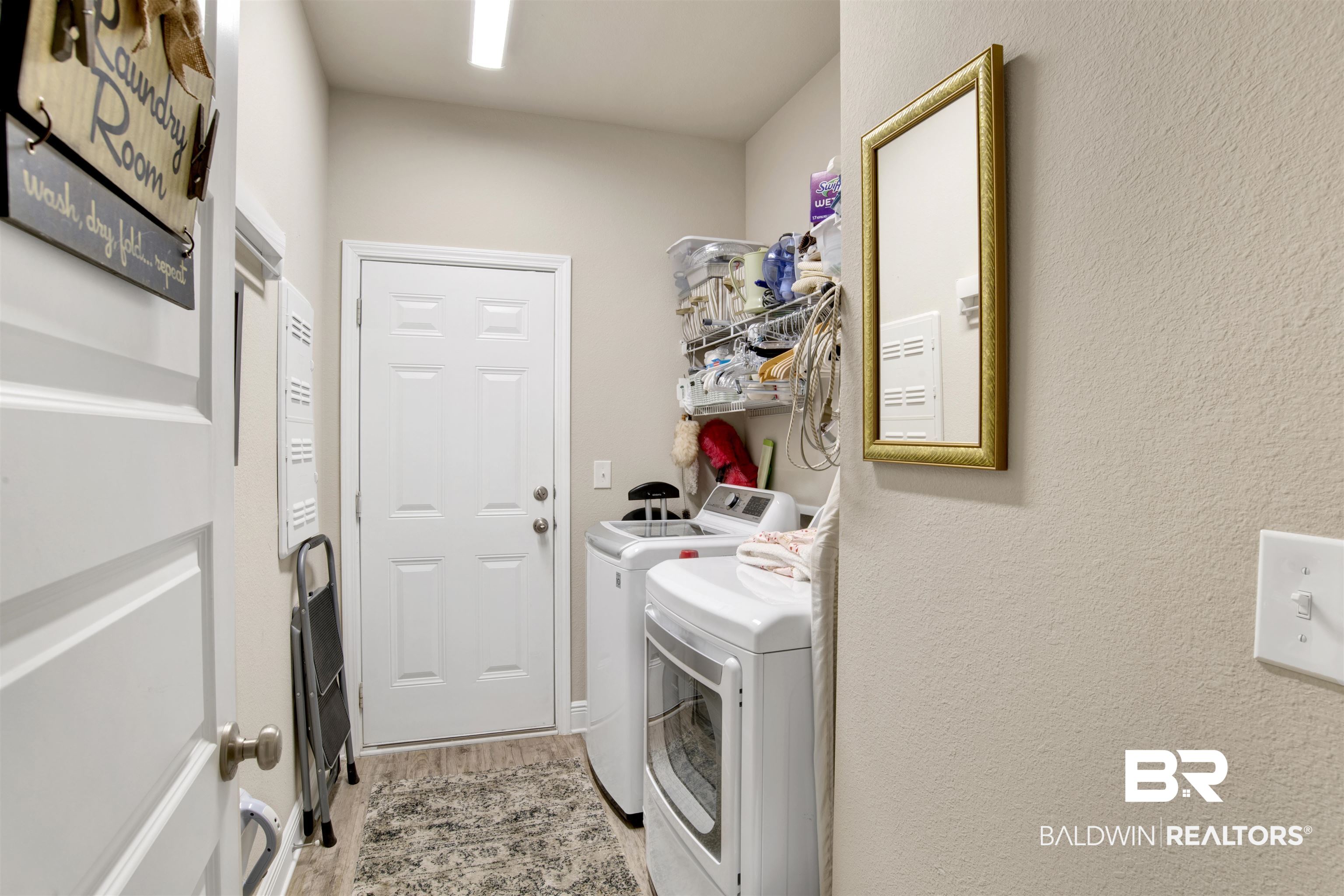 1476 Surrey Loop Foley, AL 36535 - Photo 27 of 31 Clothes washing area featuring washing machine and clothes dryer