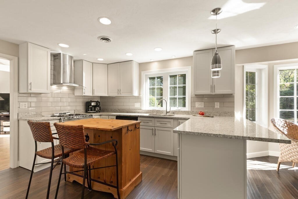 17 Azalea Road Sharon, MA 02067 - Photo 13 of 35 a kitchen with a sink window and cabinets