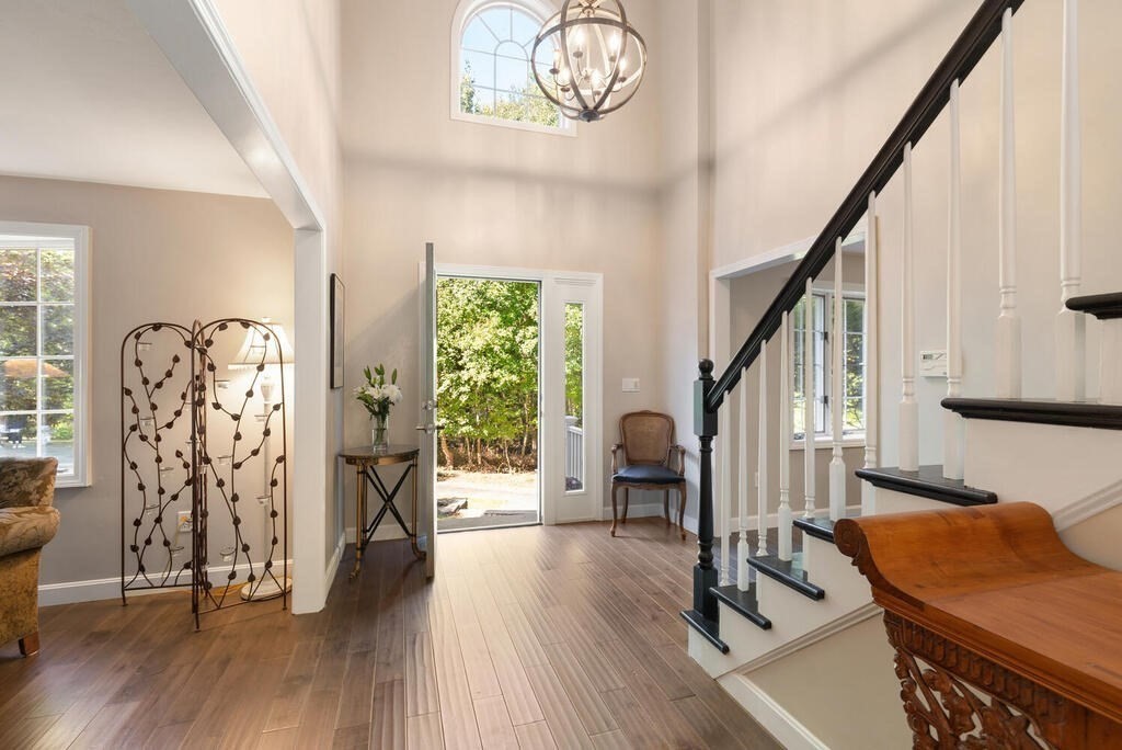17 Azalea Road Sharon, MA 02067 - Photo 3 of 35 a view of hall with wooden floor and front door