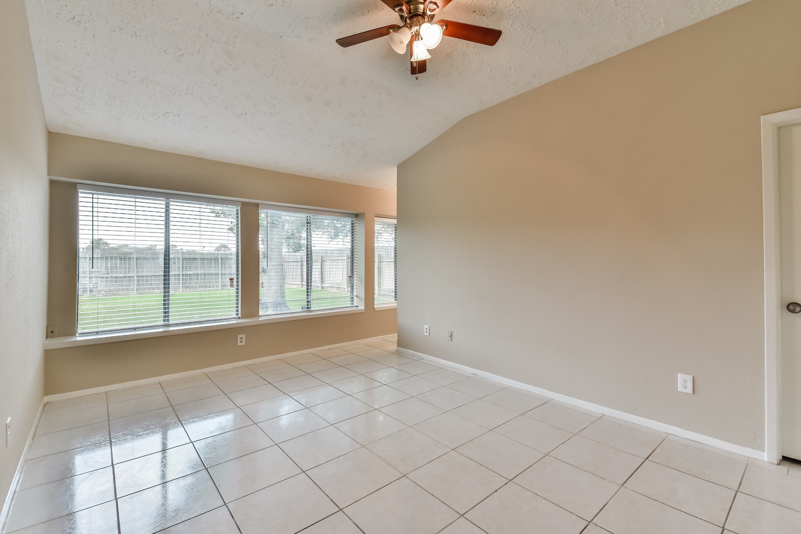 9503 Bent Spur Lane Houston, TX 77064 - Photo 14 of 28 a view of an empty room with a window