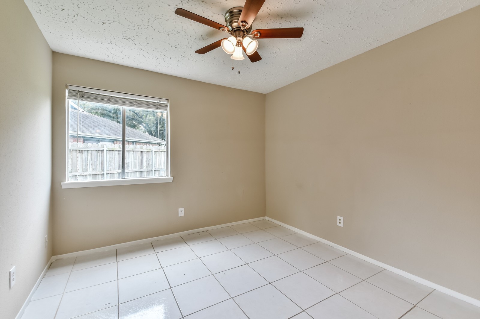 9503 Bent Spur Lane Houston, TX 77064 - Photo 21 of 28 a view of an empty room with a window