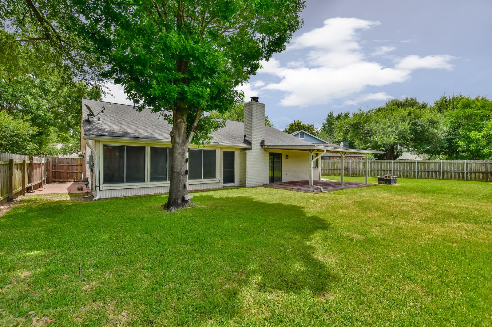 9503 Bent Spur Lane Houston, TX 77064 - Photo 28 of 28 a front view of a house with a garden