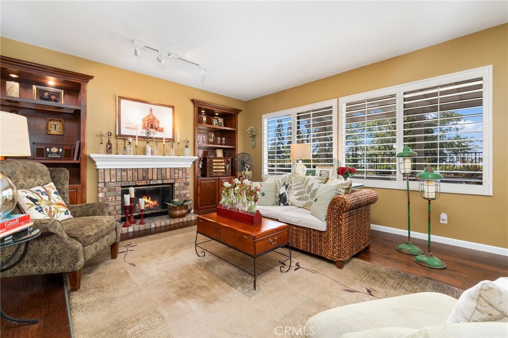 13939 Guidera Drive Rancho Cucamonga, CA 91739 - Photo 13 of 46 a living room with furniture and a large window