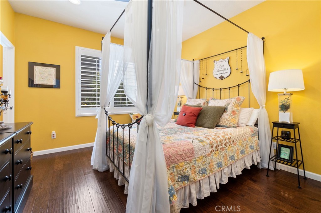 13939 Guidera Drive Rancho Cucamonga, CA 91739 - Photo 15 of 46 a bedroom with bed and a window