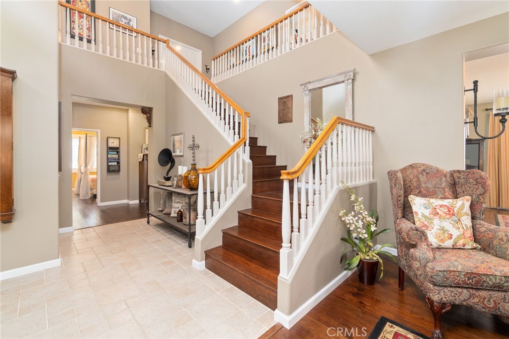 13939 Guidera Drive Rancho Cucamonga, CA 91739 - Photo 20 of 46 a view of entryway and hall with wooden floor