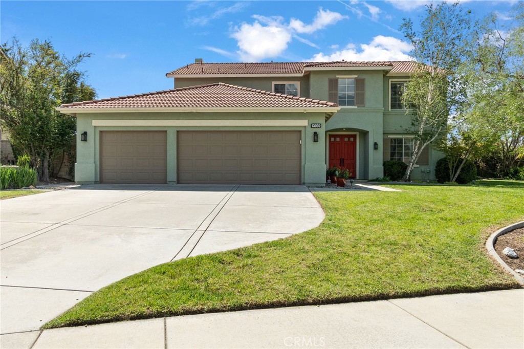 13939 Guidera Drive Rancho Cucamonga, CA 91739 - Photo 2 of 46 a front view of a house with yard