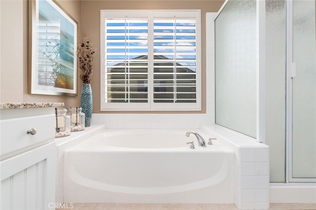 13939 Guidera Drive Rancho Cucamonga, CA 91739 - Photo 26 of 46 a white bath tub sitting next to a window