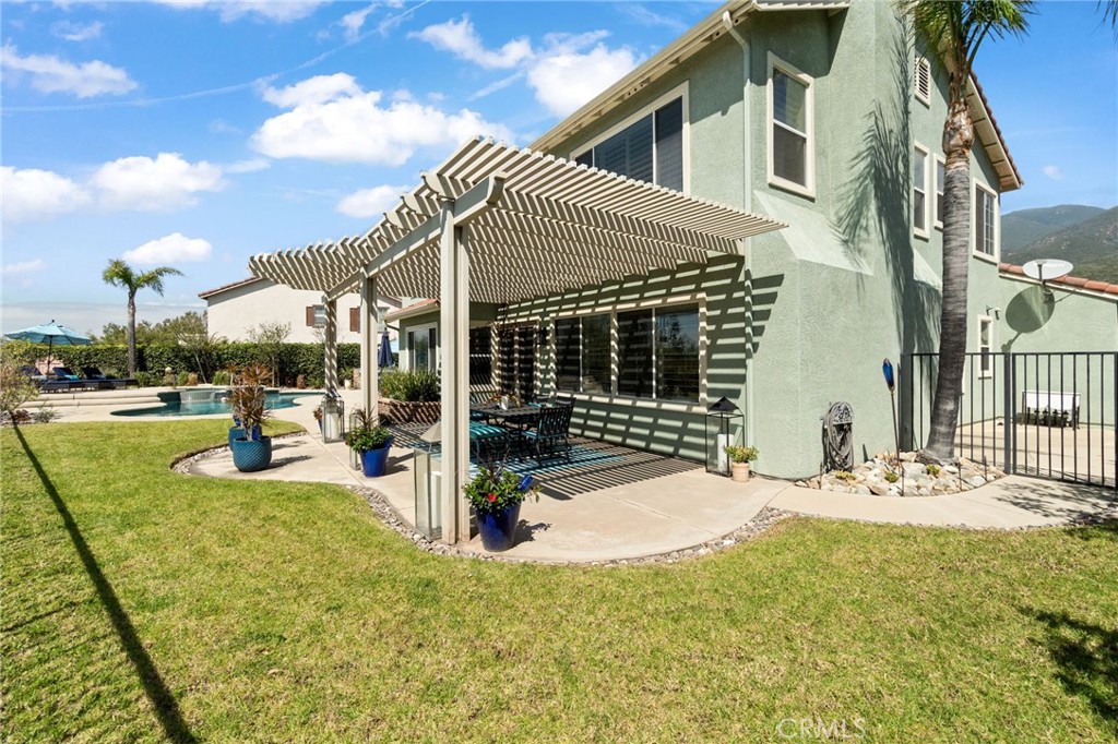 13939 Guidera Drive Rancho Cucamonga, CA 91739 - Photo 40 of 46 a view of a house with backyard
