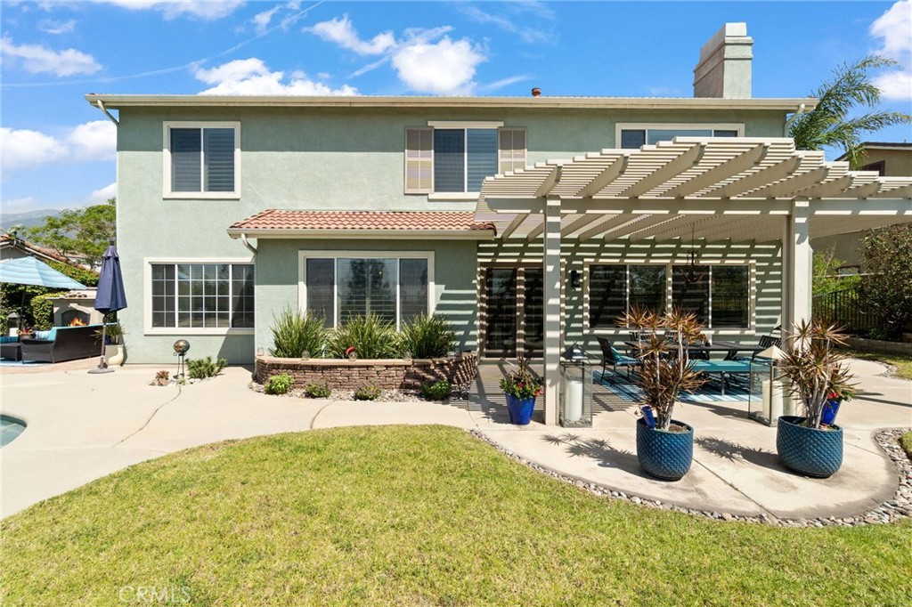 13939 Guidera Drive Rancho Cucamonga, CA 91739 - Photo 41 of 46 a view of a house with outdoor seating